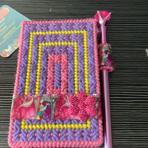Sally & Jack themed note pad case with pad and pen.